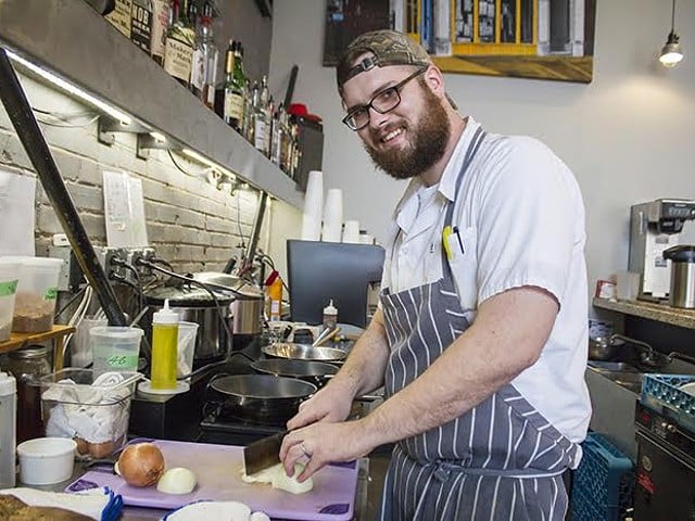 Justin Bell went from the woods to Squatters Cafe.
