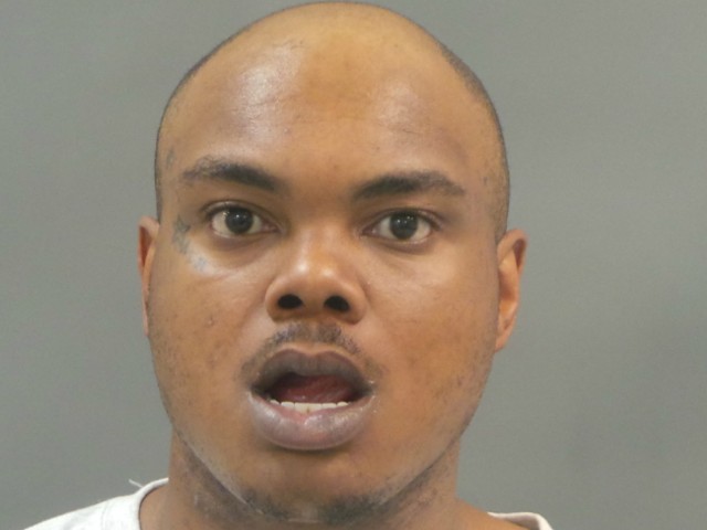 Montel Smith is charged with the murder of an alleged accomplice in a robbery.