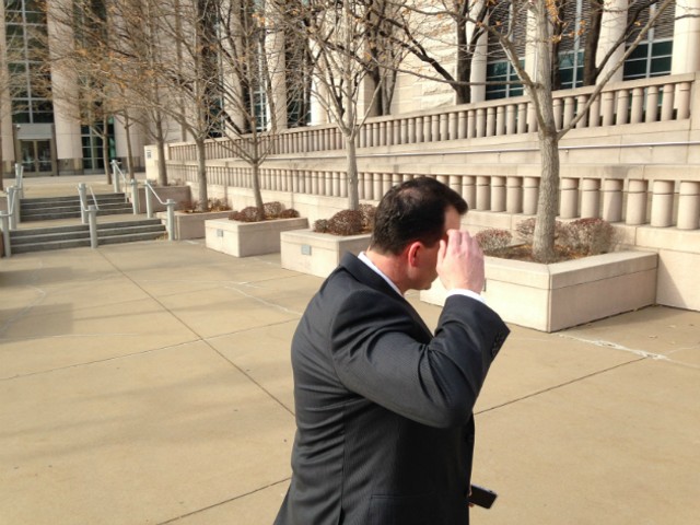 William Cafarella dodges the camera in December 2016 as he leaves federal court.