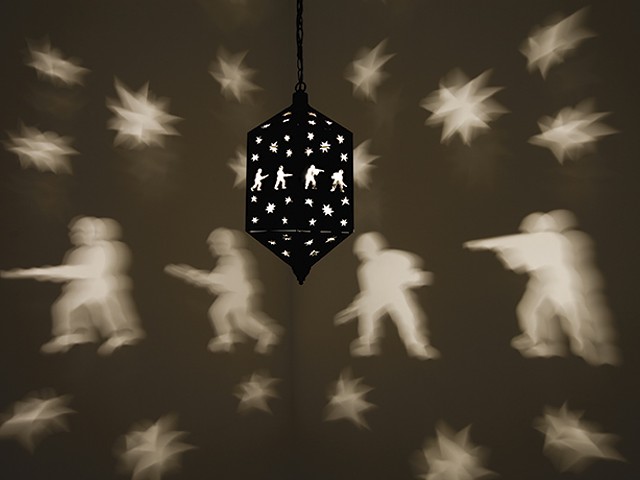 Misbah, 2006–07. Brass lantern, metal chain, light bulb and rotating electric motor, dimensions variable. Rennie Collection, Vancouver. © Mona Hatoum. Image courtesy of Fondazione Querini Stampalia Onlus, Venice. Photo: Agostino Osio 