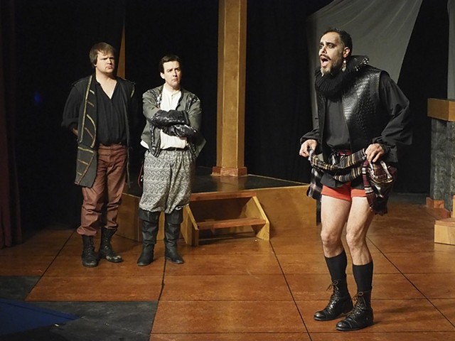 Guildenstern and Rosencrantz (Ted Drury and Robert Thibaut) observe the Player's (Isaiah Di Lorenzo) latest lesson.
