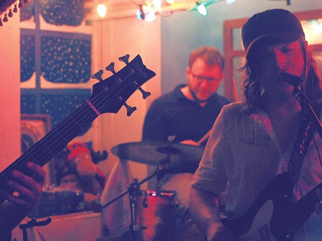 Traveling Sound Machine drummer Steve Larson (center) and bandleader Steven Lickenbrock perform at their new album's release party.