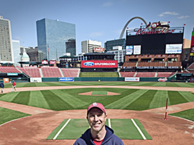 A sunny day at the office makes Cardinals head groundskeeper Bill Findley smile.