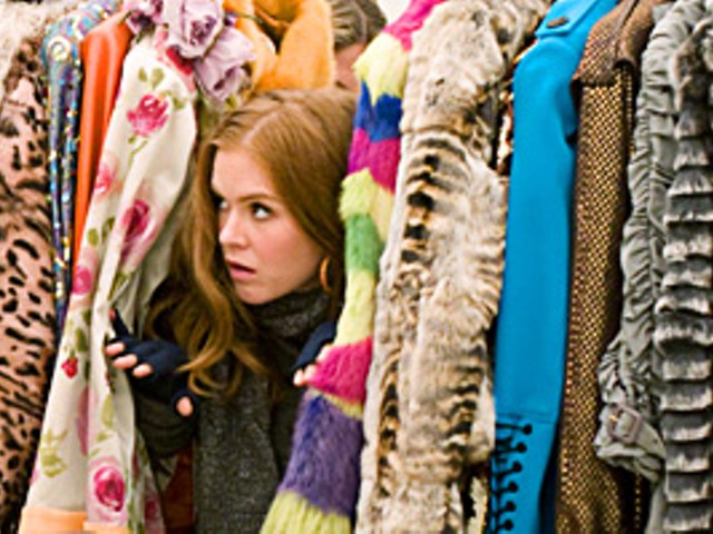Rebecca Bloomwood (Isla Fisher) hides 
    her financial woes behind shameless 
    fashion plugs.