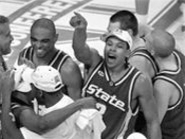 Michigan State guard Shannon Brown (pointing) and 
    his teammates celebrate their win over Kentucky to 
    advance to the Final Four. Our "expert" predicts more 
    Spartan partyin'.