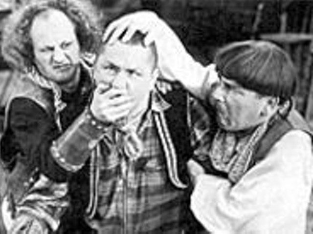 Larry and Moe check Curly's head for lumps before 
    deciding to administer same.