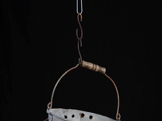 Rick Egea; galvanized steel bucket riddled with rusty nails.