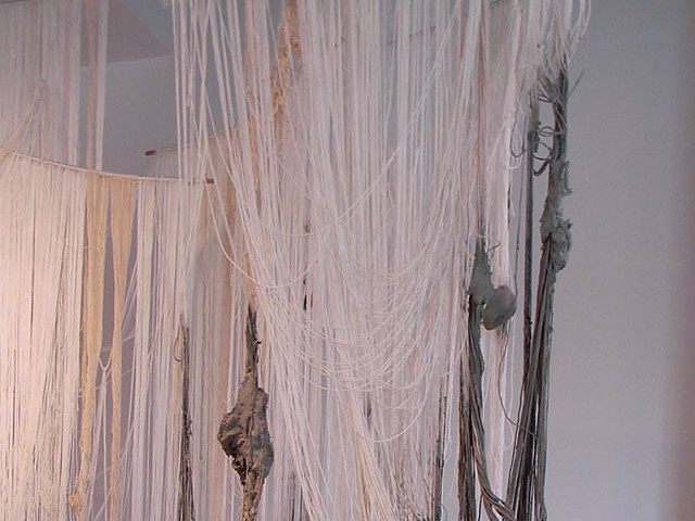 Kristin Fleischmann, A Silkworm of One's Own, string, cement and wood.
