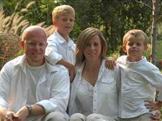 Christopher Coleman with his wife, Sheri, and sons Garett and Gavin.