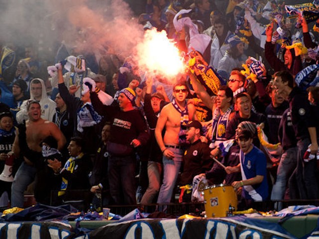 Fans of Bosnia-Herzegovina's national soccer team light flares at Busch Stadium. SEE ALL PHOTOS