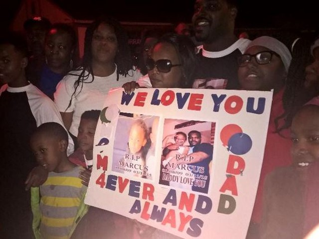 The family of Marcus Johnson held a candlelight vigil Sunday night to remember the slain six-year-old.