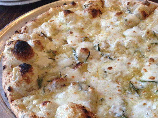 Neapolitan-style pizza with white bechamel sauce, Extra Virgin Olive Oil, Fresh Mozzarella, fresh garlic, fresh rosemary and hand-grated parmesan. | Nancy Stiles