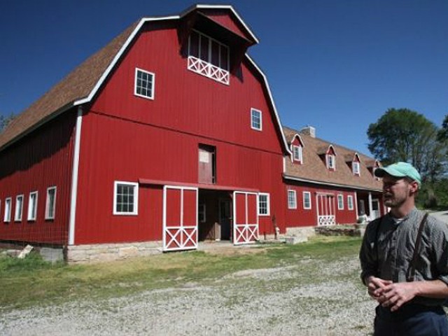 Steve Baetje in front of the barn that serves as his cheese making headquarters.