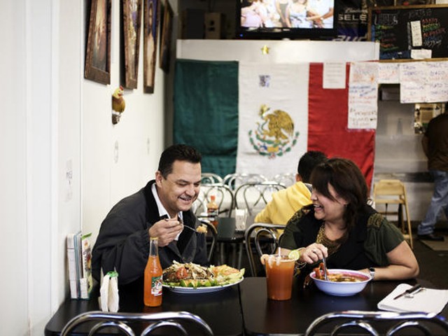 Tony and Brenda Garcia, husband and wife co-owners of La Tejana. Let's pretend one of them is eating the carnitas plate.