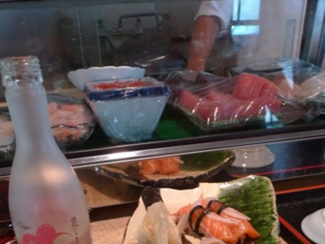 Salmon Avocado Roll, Eel Avocado Roll and pieces of Salmon, Red Snapper and Yellowtail nigiri.