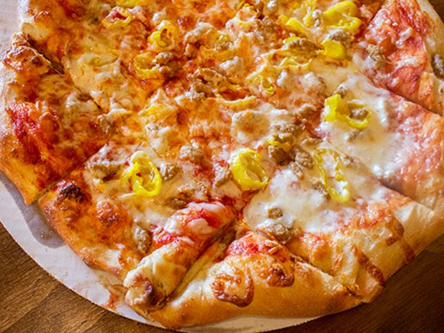 Hand-tossed sausage and banana pepper pizza.