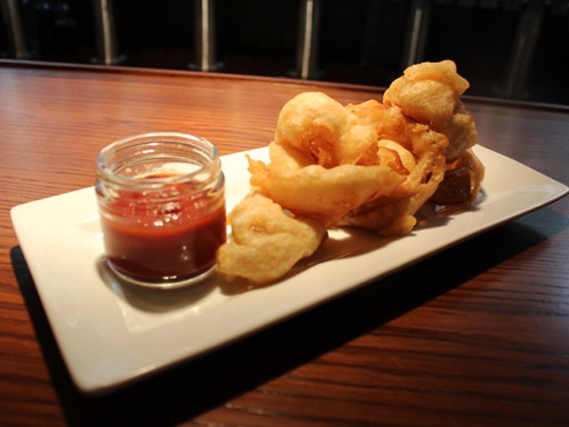 Smoked onion rings with housemade chipotle catsup at Baileys' Range.