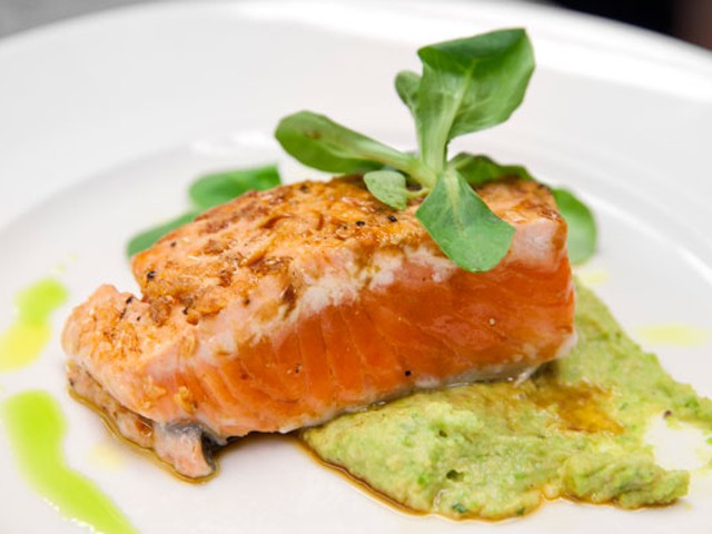 Copper River salmon a la Plancha with a soy-ginger glaze, black carrots and puree of English peas. | St. Louis Magazine