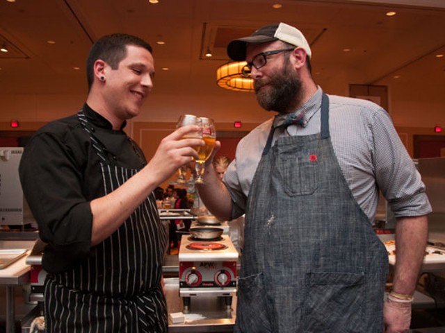 Chefs Brian Coltrain and John Perkins cheers with the secret ingredient, Stella Artois. | Micah Usher