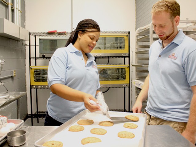 Managing partners Tamika Moore and Jonathan Weinberg in the kitchen