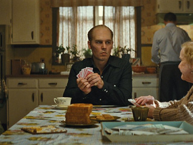 Johnny Depp and Mary Klug in Black Mass.