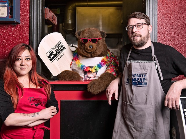 Melanie Meyer, left, and Chris Ward with their new eatery's eponymous mascot.