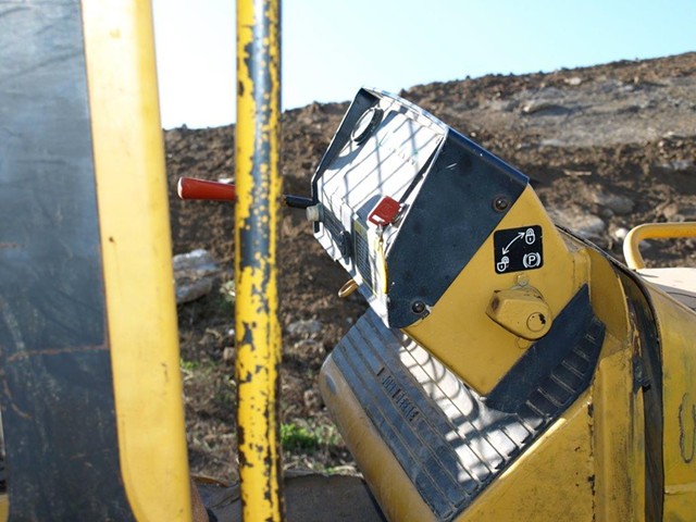 This image of the bulldozer, taken after Cassilly's death, shows the absence of blood on its dashboard.