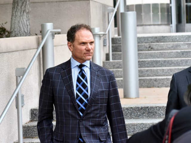 John Rallo leaves court in May 2019.