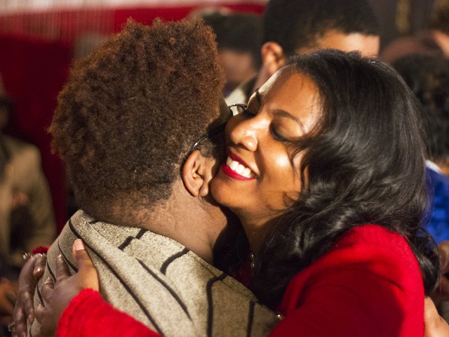 Tishaura Jones embraces Kayla Reed during an election watch party Tuesday night.
