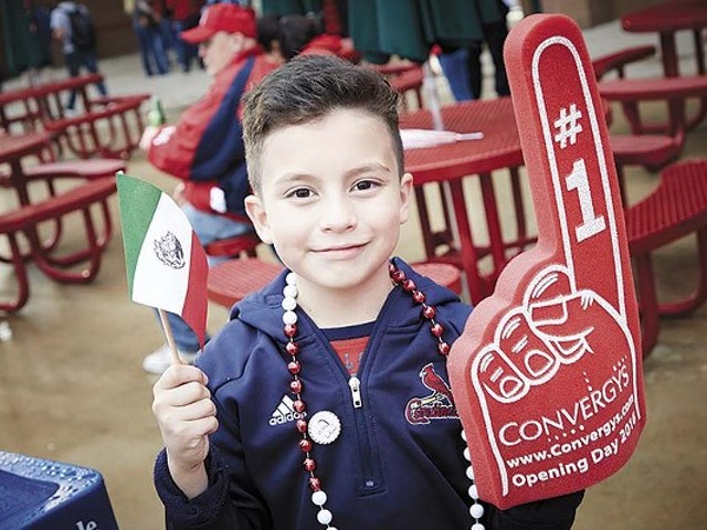A young Cardinals' fan shows off his Mexican pride at "Fiesta Cardenales."