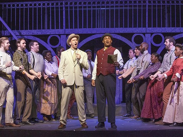 Henry Ford (Jason Meyers) and Coalhouse (Omega Jones) sing about achieving success by never giving up.