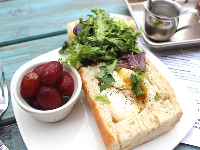 The workday sandwich with soft-boiled egg and greens on baguette.