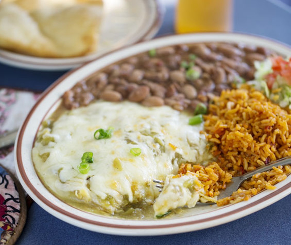 Green Chile Enchiladas - stacked corn tortillas with Monterrey jack and green chile. Add chicken, beef, chorizo, veggie chorizo or calabacitas. Comes served with pinto beans and rice. See more photos of Southwest Diner here