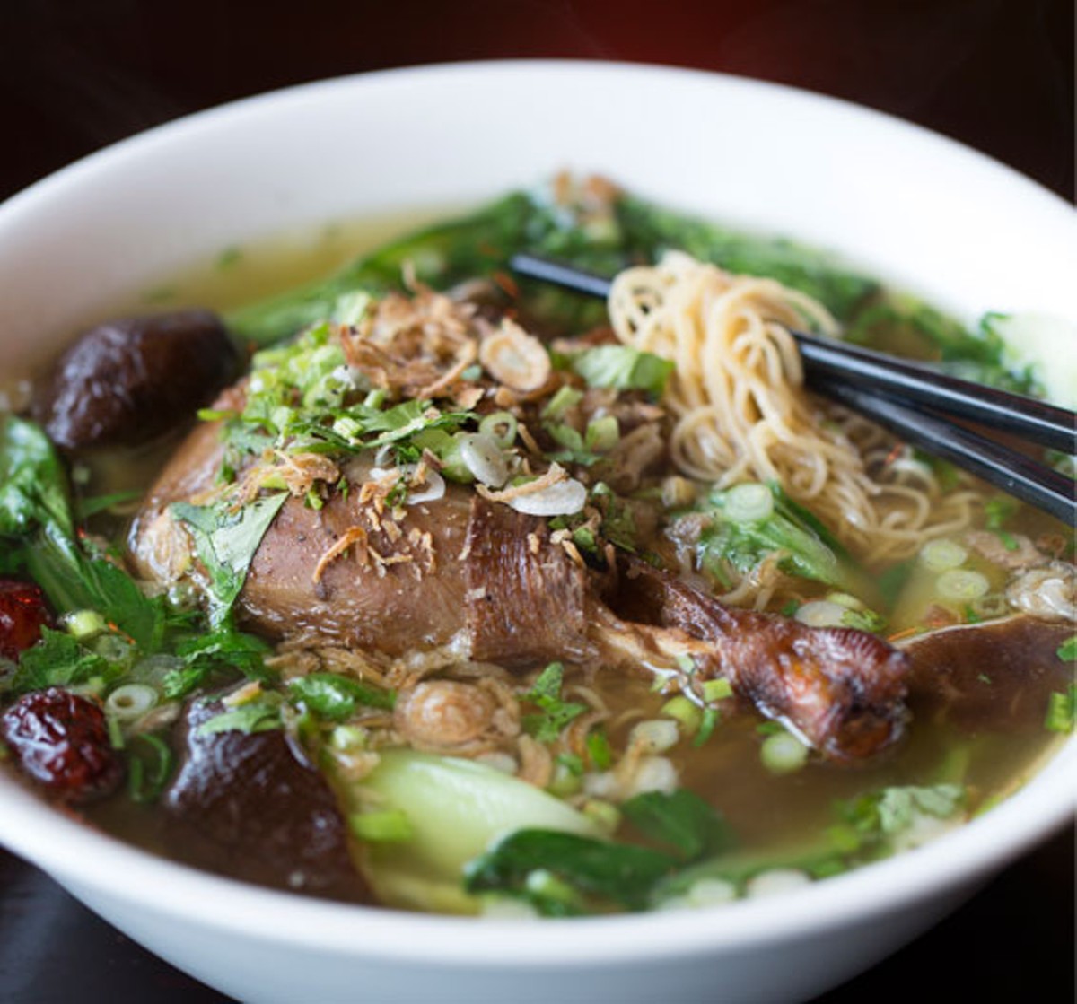 Mi vit tiem, the five-herbs duck soup, is slow cooked, served over egg noodles and baby bok choy. See also: Inside Mi Linh in Rock Hill