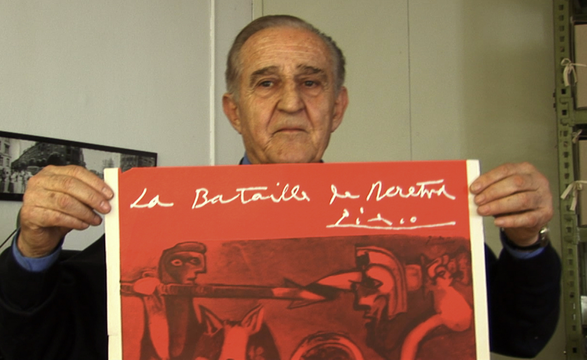 Yugoslav film director Veljko Bulajic shows off the poster for his Academy-Award nominated WWII epic Battle of Neretva, one of only two film posters Pablo Picasso ever designed.