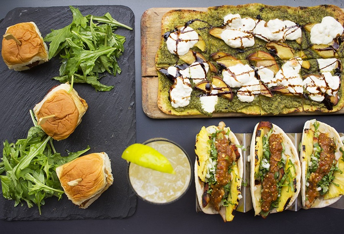A selection of items from Scapegoat: "G.O.A.T. Sliders," peach and burrata flatbread, and tacos.