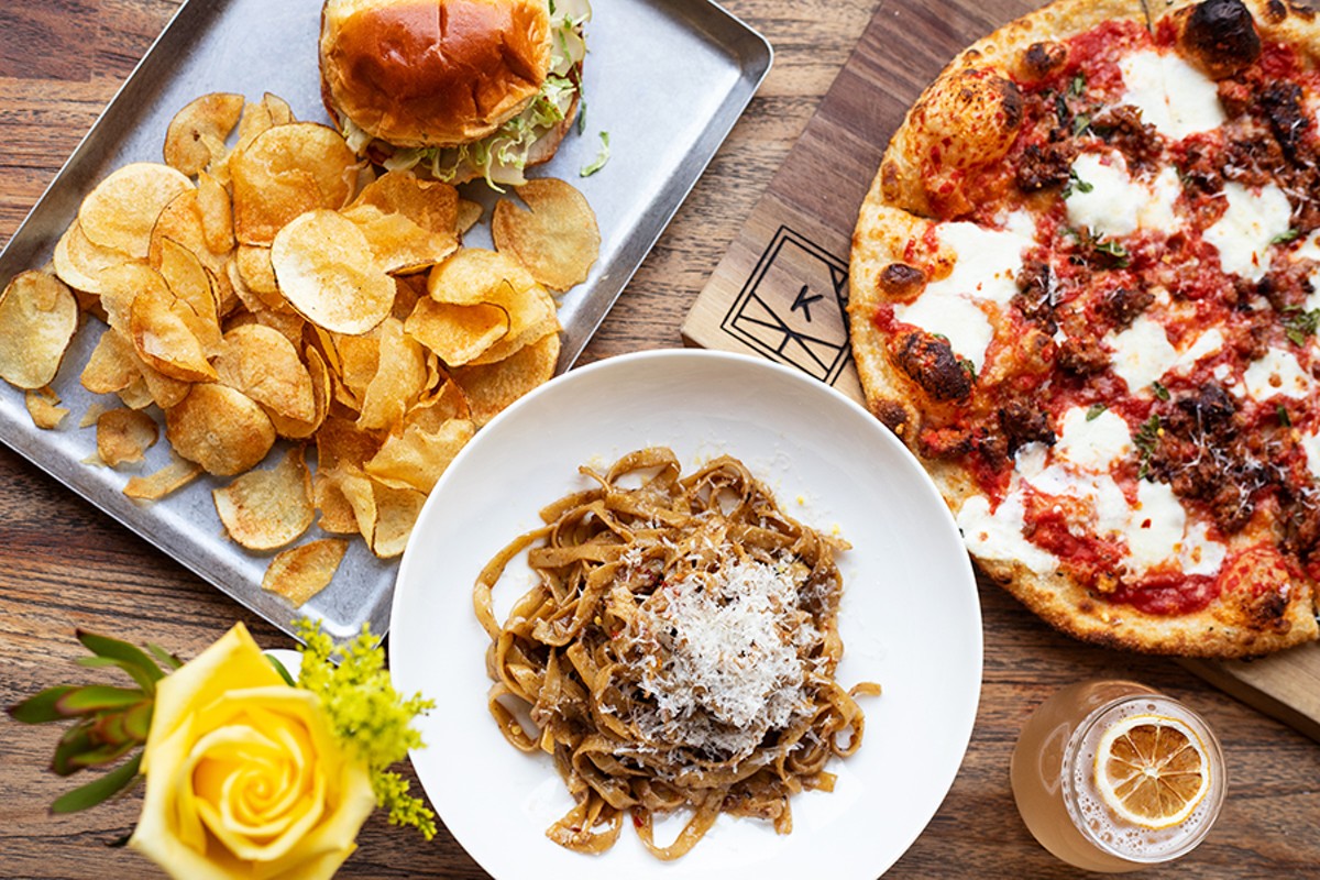 A selection of dishes from The Last Kitchen (pictured from left to right, top to bottom): pork chop sandwich, Grown Up Garlic Noodles and Salsiccia pizza.