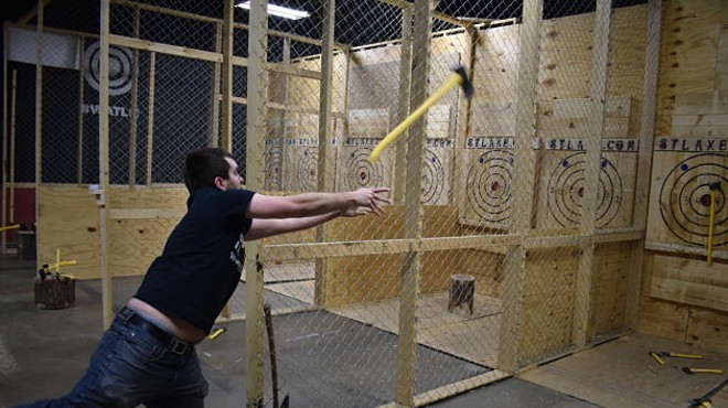 Aaron Cockrell, STL Axe Throwing's owner, shows how it's done.