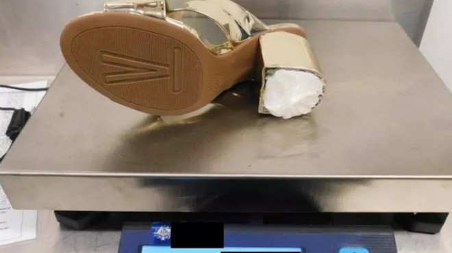 The heel of Denise Woodrum's shoe was stuffed with cocaine.