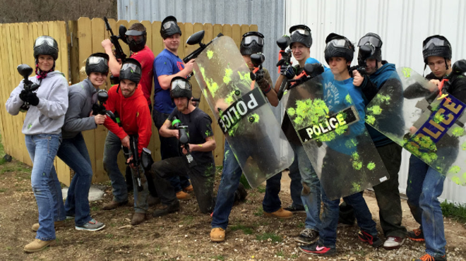 Expedia Touts the Real St. Louis Experience with Police Shields, Riot Gear