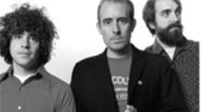 The many hairstyles of Ted Leo (center) and the 
    Pharmacists