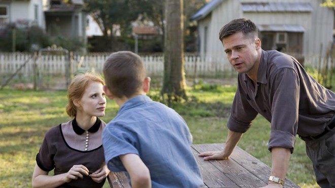 From left: Jessica Chastain, Tye Sheridan, and Brad Pitt in The Tree of Life.