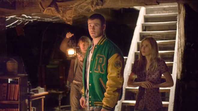 Fran Kranz, Chris Hemsworth and Anna Hutchison hunker down in The Cabin in the Woods.