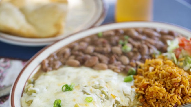 Green Chile Enchiladas - stacked corn tortillas with Monterrey jack and green chile. Add chicken, beef, chorizo, veggie chorizo or calabacitas. Comes served with pinto beans and rice. See more photos of Southwest Diner here