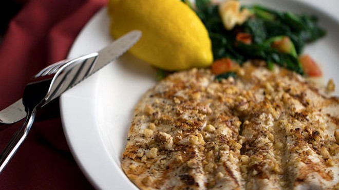 Walnut-encrusted trout with lemon butter and spinach. Slideshow: Inside Pan D' Olive on McCausland