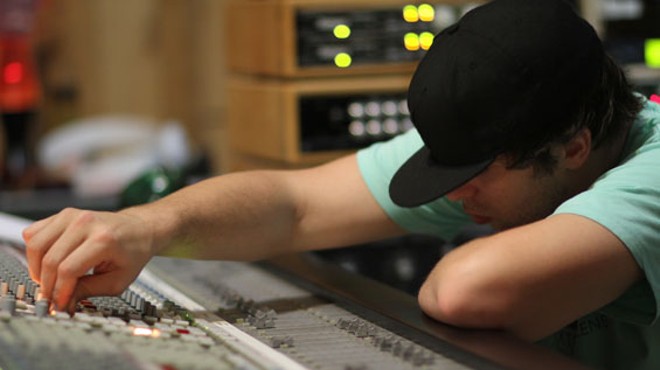 Derek Vincent Smith a.k.a Pretty Lights at the mixing board