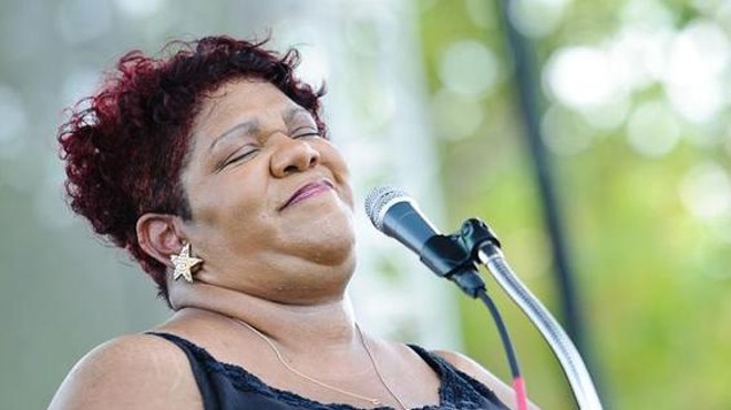 Kim Massie, TOCO's Woman of the Year, performs at LouFest in 2010.