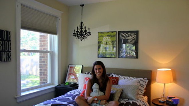 Dormify founder and Wash. U. senior Amanda Zuckerman in the bedroom of her off-campus apartment, decorated with Dormify's Fall Into Fall bedding collection.