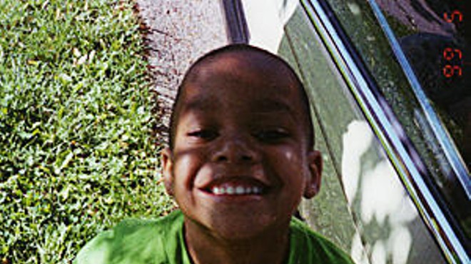 Christian Ferguson in an undated photograph from the 1990s. Says his mother, Theda Thomas: "Some people never knew he could walk and talk, how he loved to sing, how he prayed all the time."