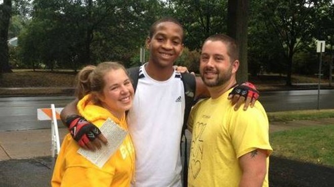 Cornell McKay (center) with Pastor Chris Douglas and his wife, Tayra, in August 2012.